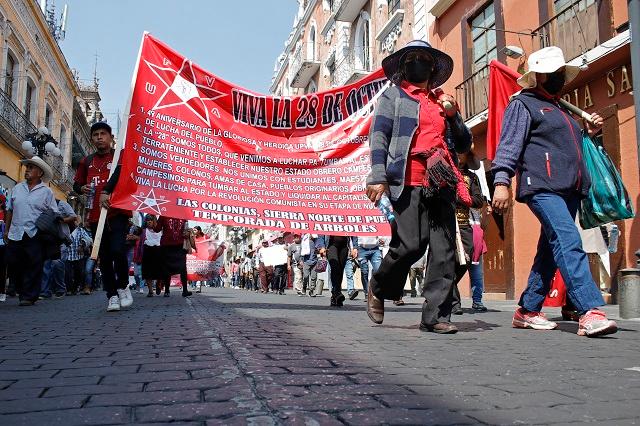 La 28 de Octubre marcha en Puebla; acusa amenazas de narcotraficantes