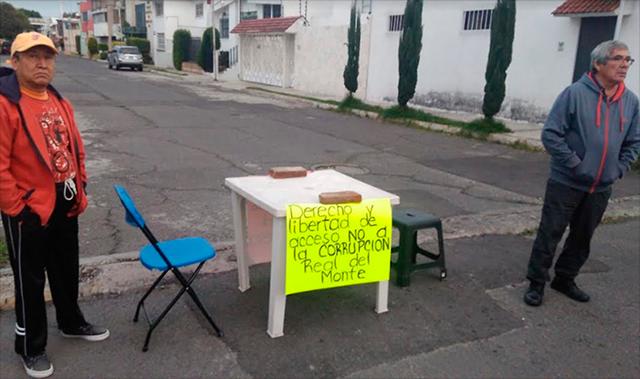 Conflictos por rejas que cierran calles, crecen en colonias de Puebla