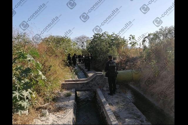 Hallan cadáver de adolescente en canal de riego de Tehuacán